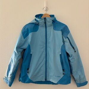 L.L.Bean blue hooded rain jacket appears to be the Weather Challenger 3-in-1